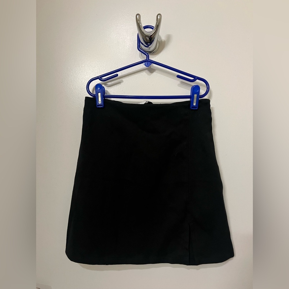 high rise mini skirt with front side slit. Great for a dinner or night out